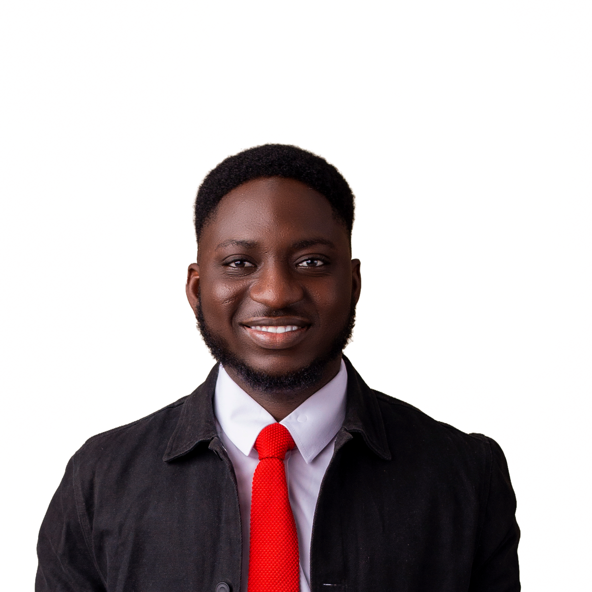Michael Akintayo smiling in a dark jacket and red tie